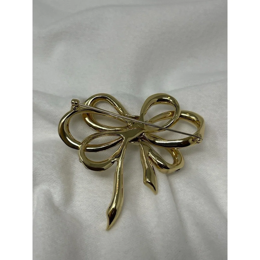 Vintage KJL For Avon Bow Pin Brooch Crystal Gold Tone Kenneth Jay Lane 2 3/4 In.